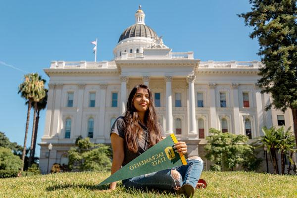 Student in front of Capitol Building